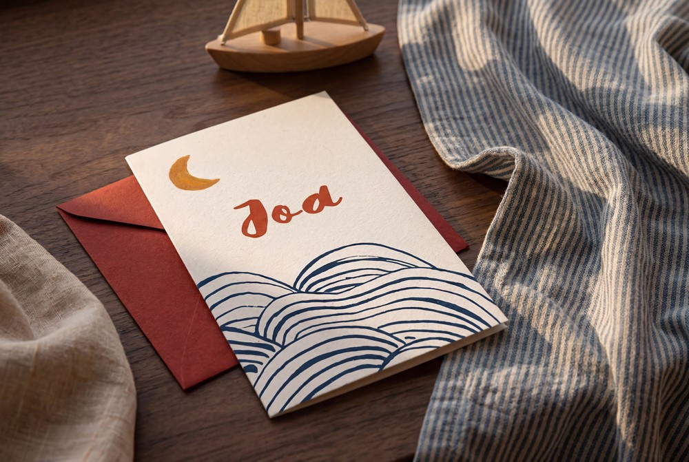 Geboortekaartje Joa met terracotta envelop, handgetekende golven van de zee en luxe aquarelpapier